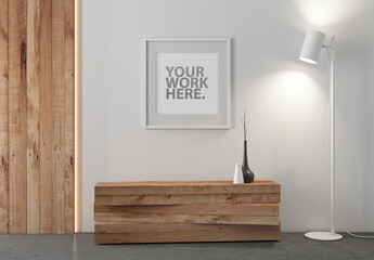 Square poster in white frame mockup with passepartout hanging on wall in room