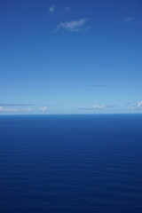 Vast Ocean Horizon Under a Clear Blue Sky