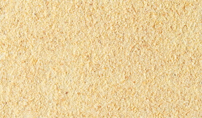 Dried granulated garlic background and texture, top view 