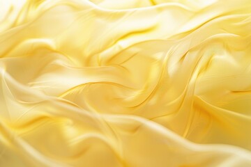 A close-up shot of bright yellow fabric with texture and weave visible