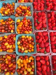 tomatoes and berries in market