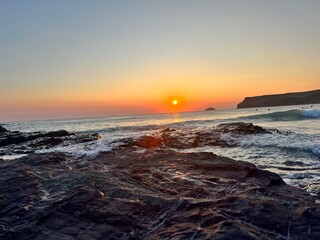 sunset over the sea in cornwall