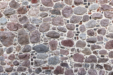 Ancient stone wall, closeup background photo texture