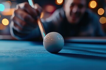 A man with a broad smile as he strikes the ball in a lively pool hall. The moment is filled with joy and camaraderie amid the clinking of balls and chatter of friends.