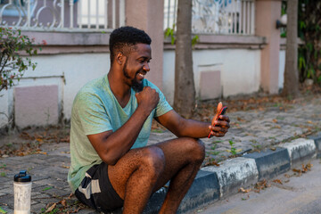 young african man using mobile phone