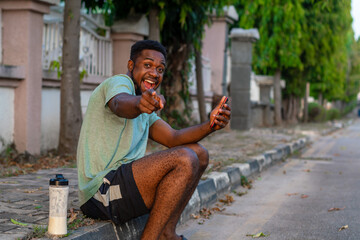 young african man using mobile phone