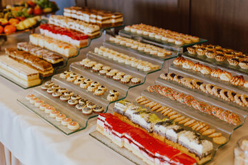 Table with cakes and sweets, wedding reception, birthday, sweet table, Polish cakes, food at the wedding, babyshower
