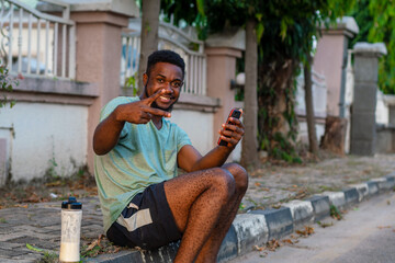 young african man using mobile phone