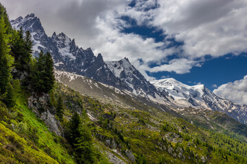 Val Ferret, located on the Tour du Mont Blanc in Italy, a picturesque mountain landscape. Ideal for photography, it features alpine peaks, lush valleys, and scenic trails in Courmayeur, Italy