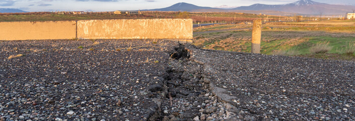 Cracked old asphalt, road safety concept