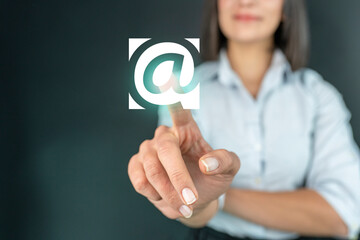 Businesswoman touch email icon on hand, communication concept