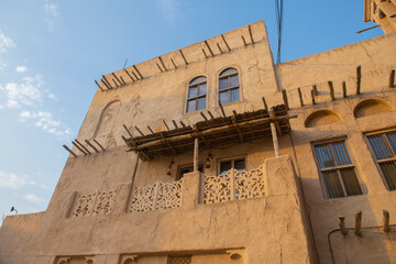 Historic Islamic style building in Al Fahidi Historical Neighbourhood (Al Bastakiya) at Dubai Creek in Dubai Old Village, city of Dubai, United Arab Emirates UAE. 