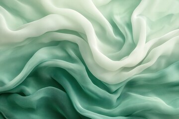 Obraz premium Abstract green and white fabric background with soft waves and folds.