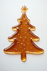 Christmas tree shape created with dripping honey for holiday decor and design