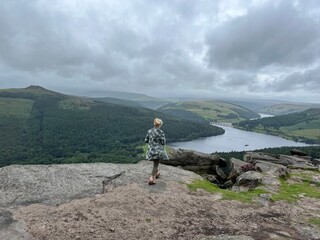 woman  on top of mountain