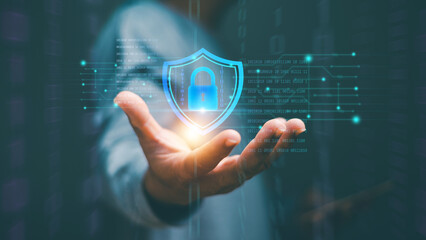 Man's hand showing personal digital data security and protection from cybercrime. Global network security technology concept, Personal data security. Protecting information from cyber attacks.