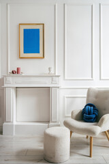 Elegant living room with minimalist decor and cozy armchair in bright setting