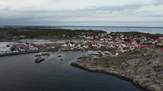 Flying with drone over the archipelago  and circling around the little town of Vrang&ouml; and the harbor with sailing yachts near G&ouml;teborg in Sweden