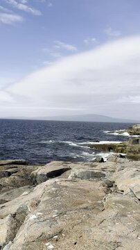 sea and rocks with waves crashing