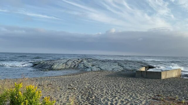 rocky shore with beach and sea