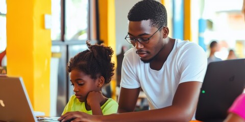  teaching coding to younger children at a school