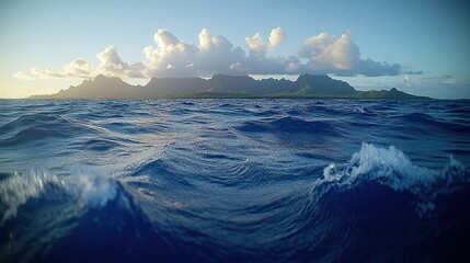 Serene ocean view with distant island landscape.