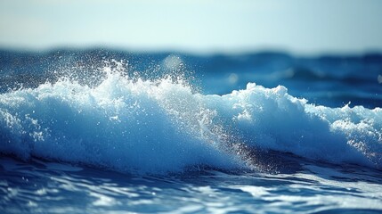 Fototapeta premium Ocean waves crashing in sunlight.