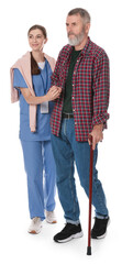 Caregiver supporting senior man with walking cane on white background. Home health care service