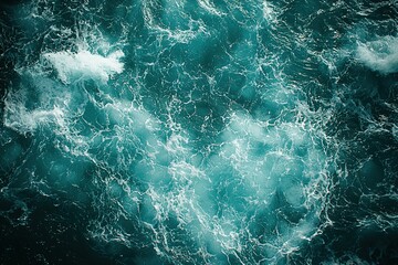 Fototapeta premium Close-up of the ocean's surface showing intricate ripples and waves, with crystal-clear water