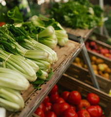 Fresh vegetables at small local urban market. Organic produce on sale at outdoor farmer market. Selling fresh crops and veggies harvest. European urban setting. Close up. Part of the series