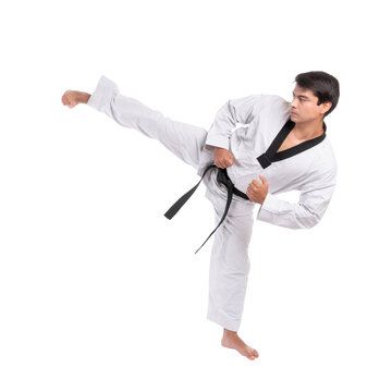 Taekwondo high kick - black belt  taekwondo athlete martial arts master , handsome man show high kick pose during fighter training isolated on a transparent png background