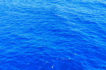 The ocean is a deep blue color