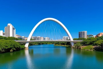Naklejka premium An artistic bridge with abstract wave-like steel arches spanning over a calm river