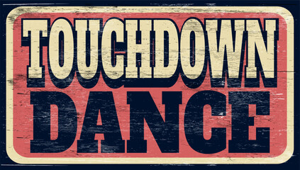 Fototapeta premium Aged and worn touchdown dance sign on wood