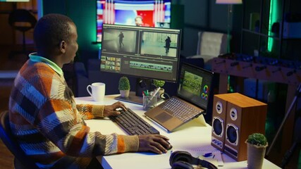 Videography specialist editing new movie clip for video montage, working on freelance contract for post production agency. Creative designer adjusting contrast using toolbar panels. Camera B.