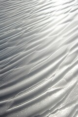 Obraz premium Silver Shimmer A Textured Background Of Wavy Lines With A Sunlight Reflection Pattern