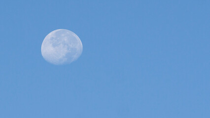 Moon in the blue sky