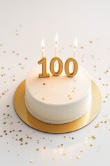 Elegant White Birthday Cake with Golden '100' Candle Toppers and Confetti