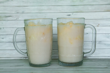 Drink from Suri Cucumber and fresh coconut milk, suri cucumber or Cucumis melo L. var. Naudin reticulatus is the fruit of a creeping plant with a fragrant aroma