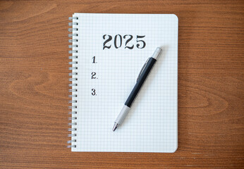 Notebook with 2025 Goals for New Year Resolutions