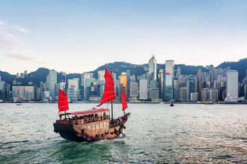 Tourist sailboat crosses Victoria harbor. Hong Kong