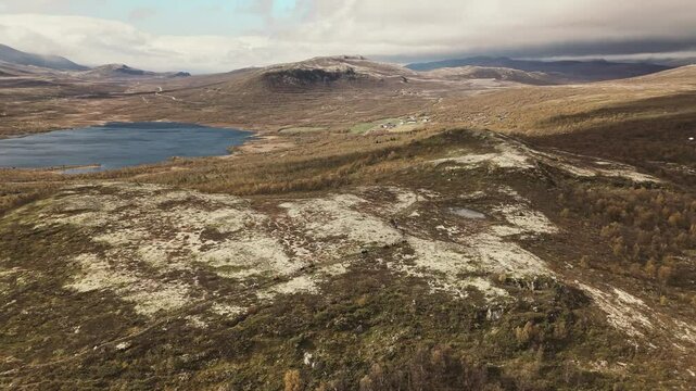 Majestic Norway landscape and group of people horseback riding into adventure, aerial view