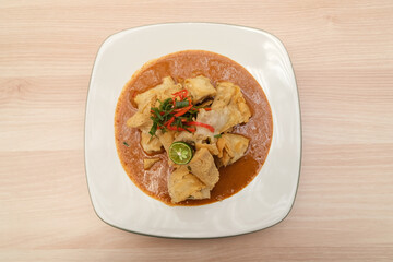 Batagor, made from fish or chicken dumpling, tofu, tapioca flour served with peanut sauce. Indonesian food
