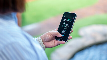 Online shopping concept, woman hands holding using mobile smart phone and making online payment, banking and online shopping. financial transaction.Digital online payment concept.