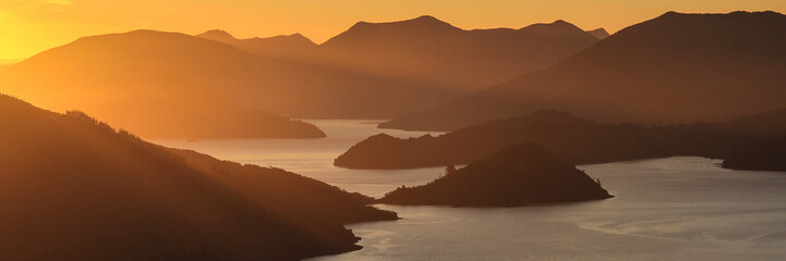 Sunset over the Kenepuru Sound, bay in New Zealand.