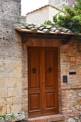 san Gimignano, Italy. September 17, 2024. Old doors in the medieval town of San Gimignano.