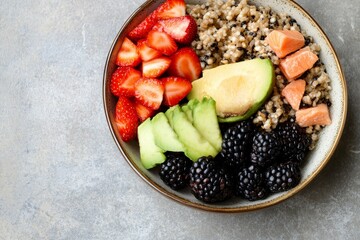 Colorful Bowl of Fresh Fruits and Grains