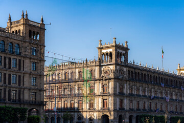 Side buildings in Zocalo Square, Mexico City, showcasing stunning colonial architecture, ornate...