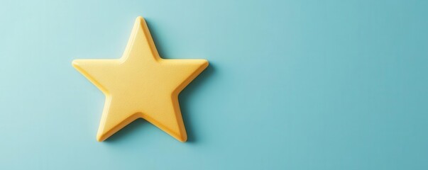 Obraz premium A bright golden star on a soft blue background, evoking feelings of positivity and celebration.