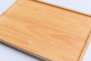 brown wooden tray isolated on white background